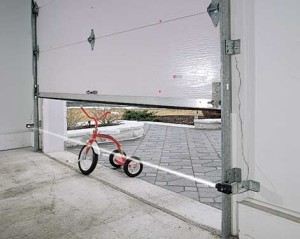 Bicycle under a closing garage door